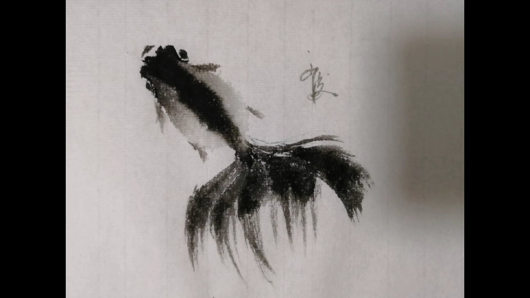 国画作品(国画写意墨色的小金鱼)画家笔法轻盈,生动活泼