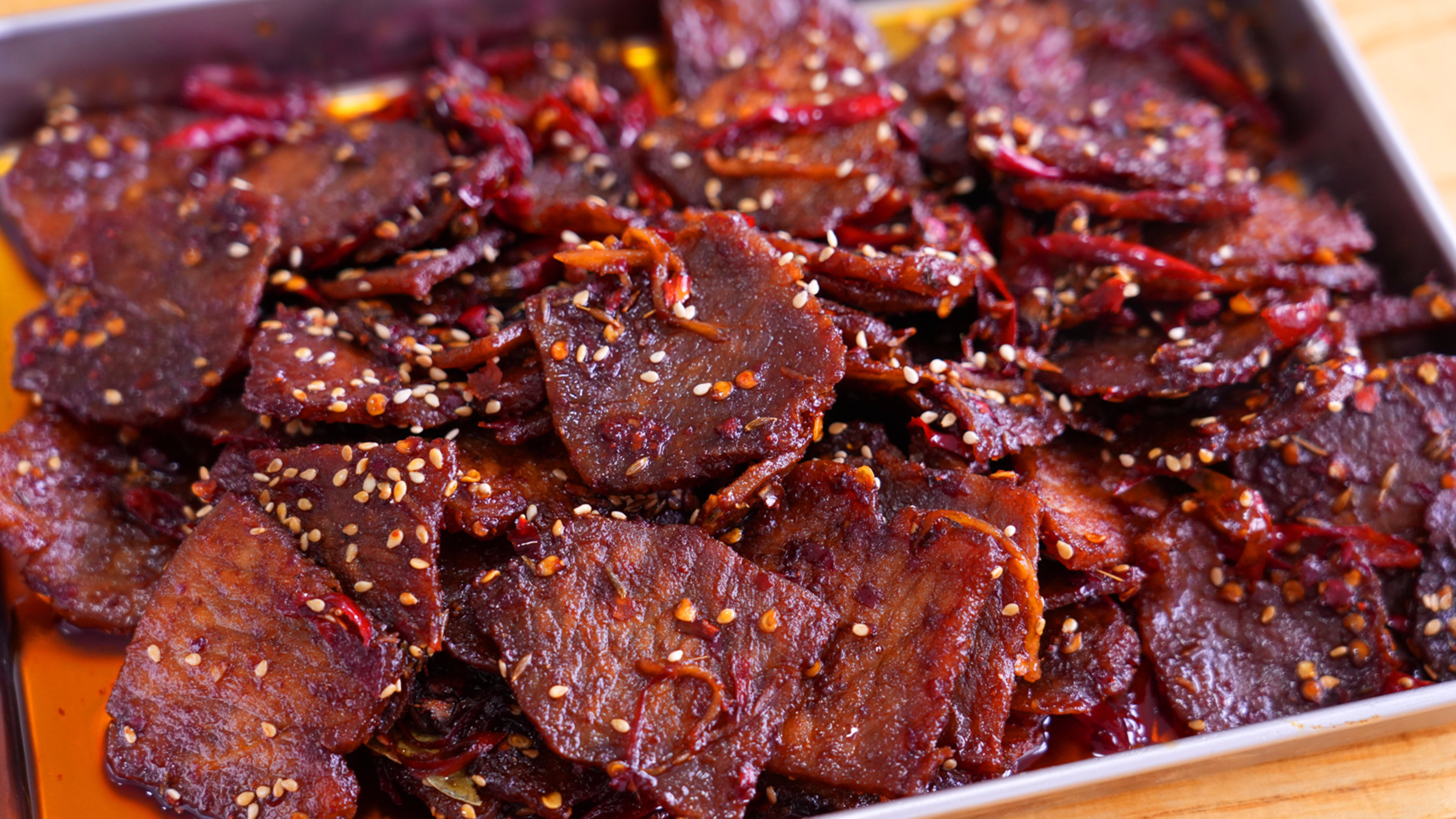 趁猪肉便宜买5斤里脊肉，做冷吃猪肉片，麻辣鲜香和吃牛肉干一样